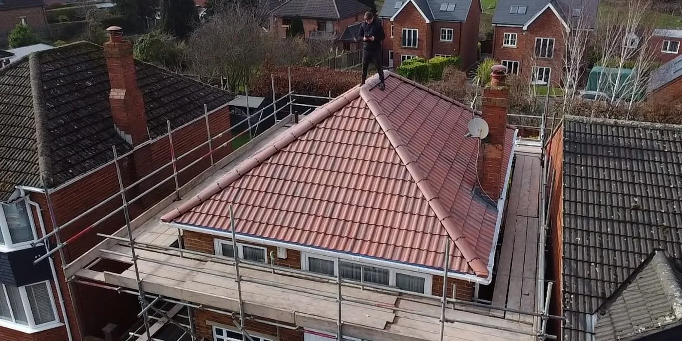 Full re-roof on a bungalow, finished in grey tiles