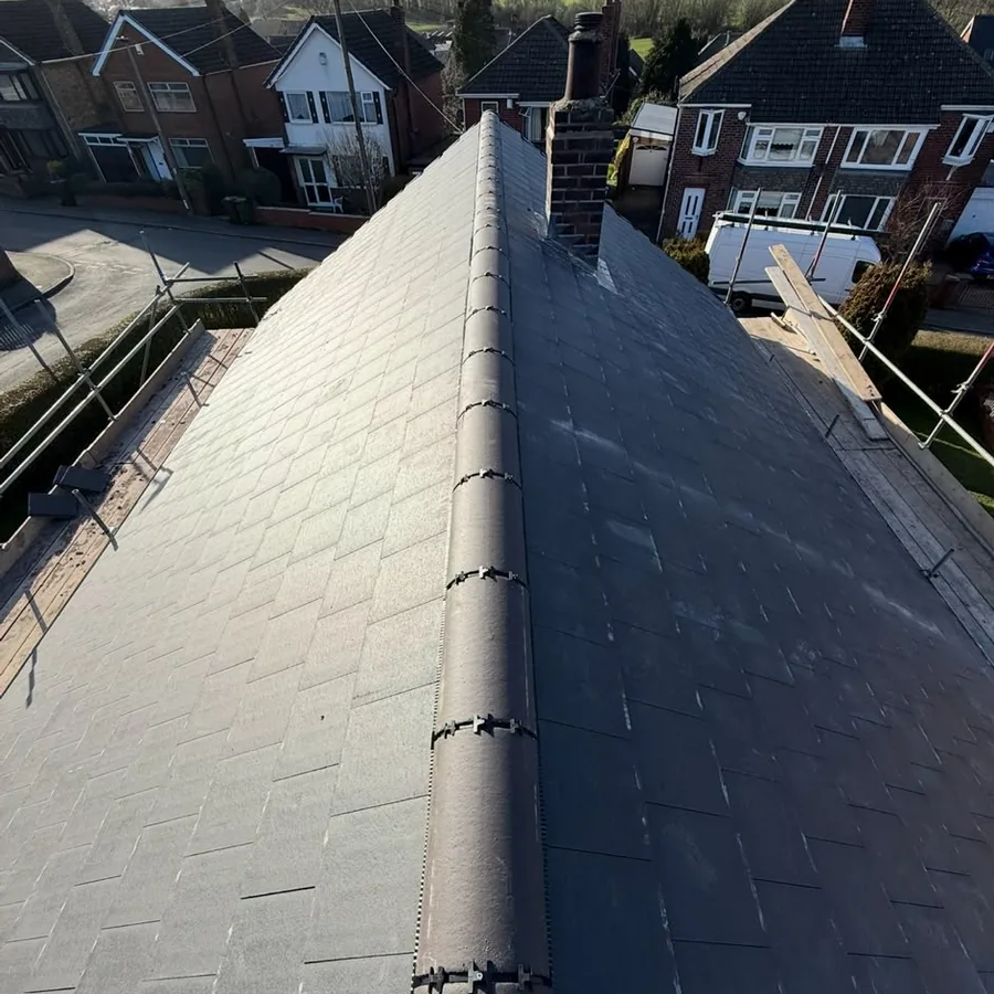 Dry ridge on a new roof, looking down the street
