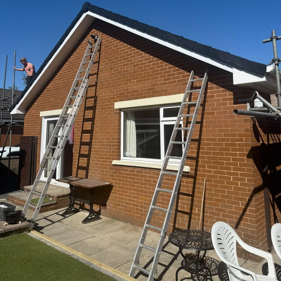 Dry verge and new white fascias on a gable end