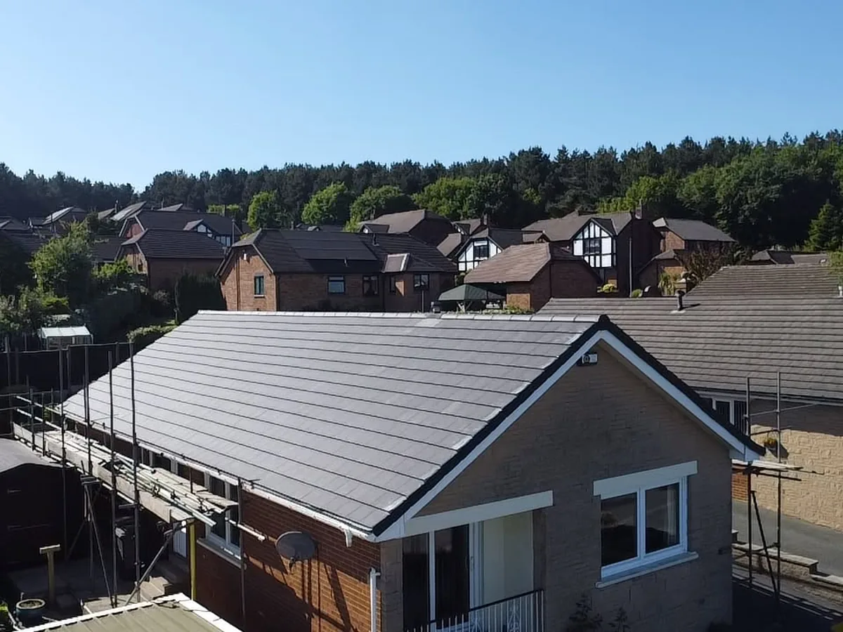 Full re-roof on a bungalow, finished in grey tiles