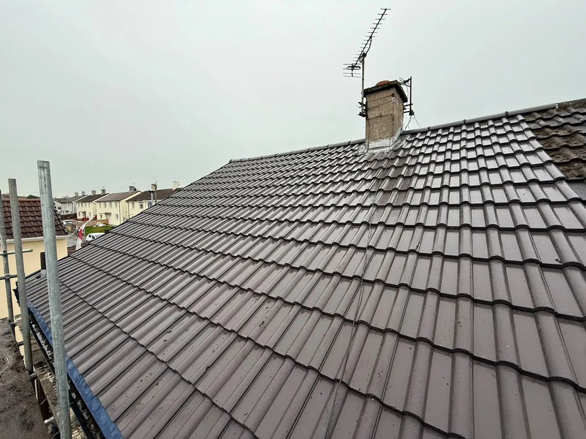 New interlocking tiles with fresh chimney flashing